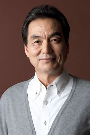 長塚京三