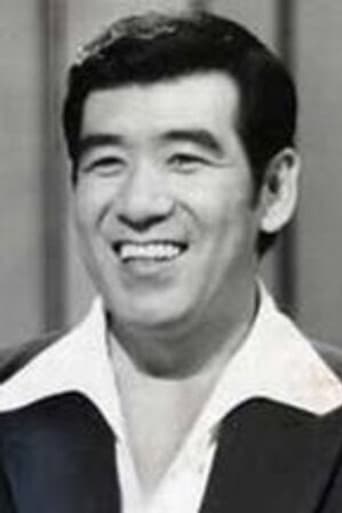 谷幹一